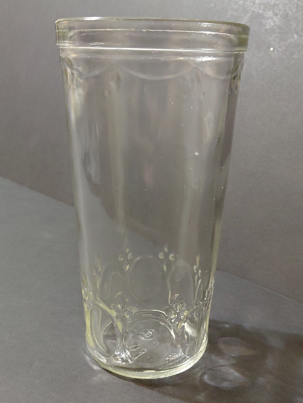Vintage Clear Pressed Glass Drinking Tumbler with Embossed Decorative Details